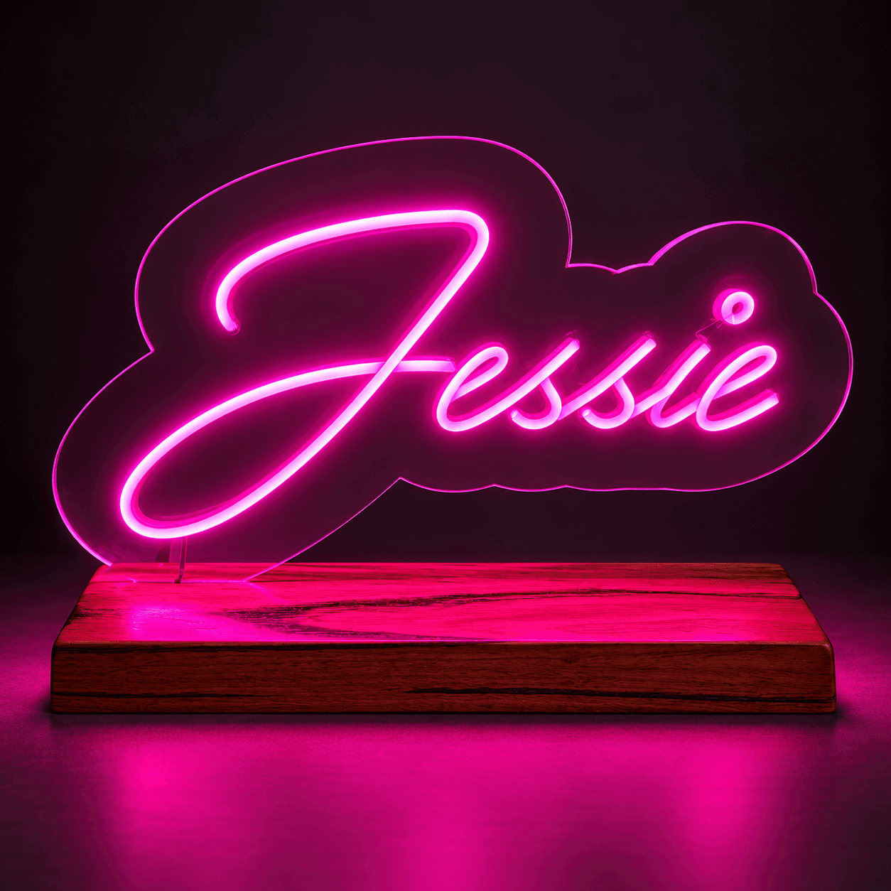 Personalised LED name sign with glowing custom lettering on a shaped backing