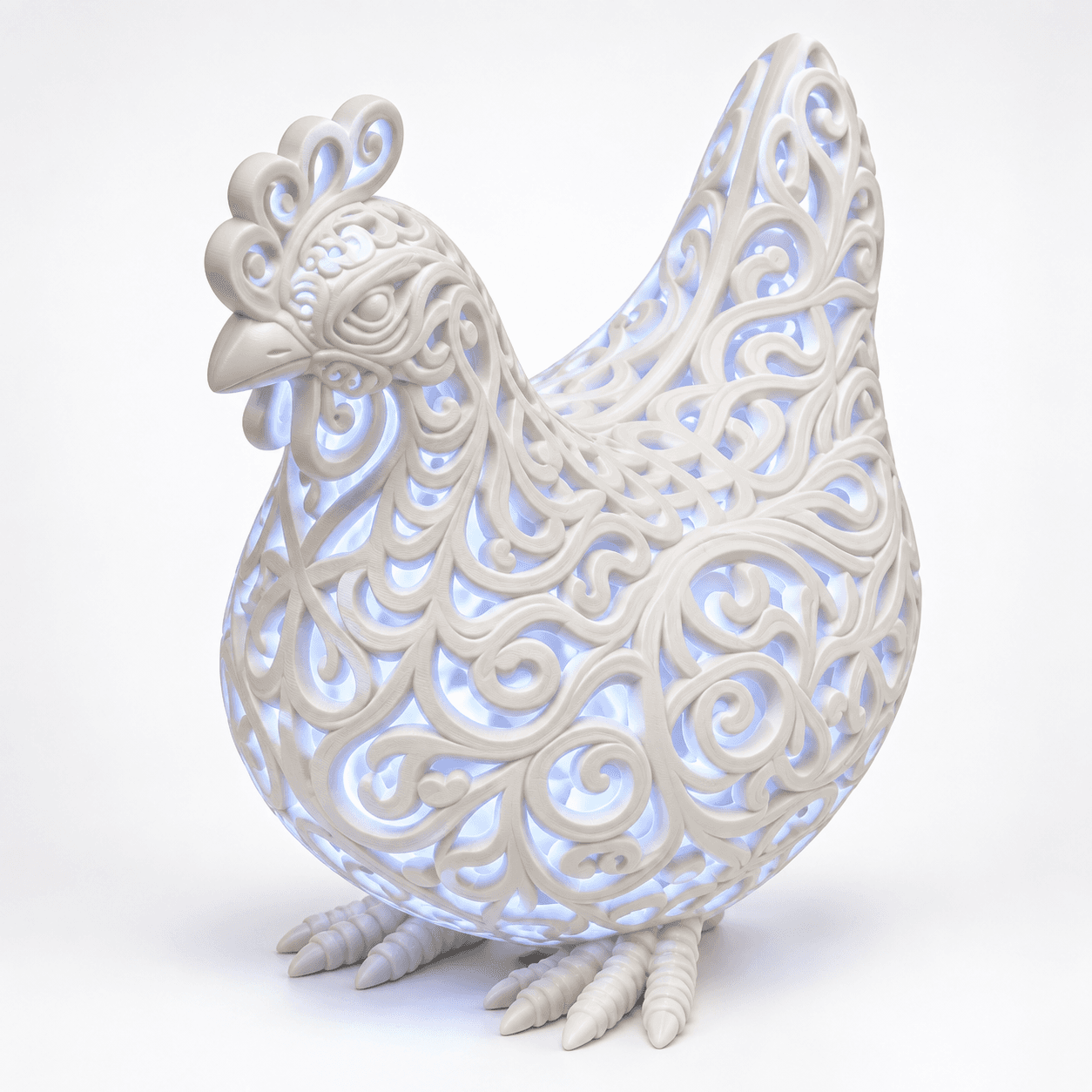 White filigree chicken LED lamp glowing softly through intricate scrollwork